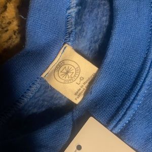 Urban outfitters “bloom where you are planted” Crewneck sweatshirt. BNWT